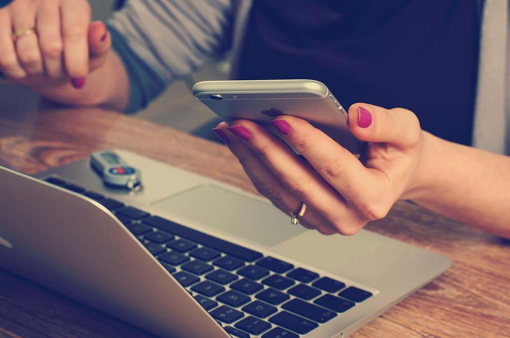 Accountant using her phone in an office