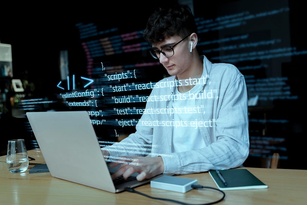 Young businessman learning how to code with AI