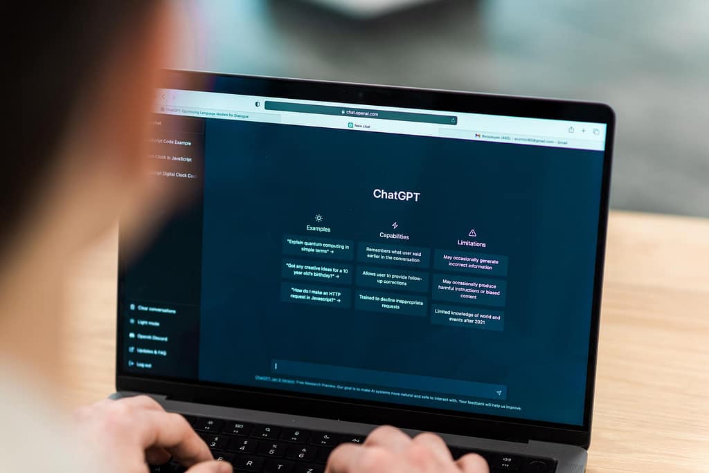 Person using ChatGPT to code