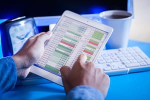 Businessman using an account management app